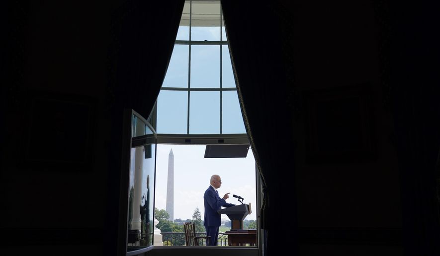 President Joe Biden speaks before signing two bills aimed at combating fraud in the COVID-19 small business relief programs Friday, Aug. 5, 2022, at the White House in Washington. Over five decades in Washington, President Joe Biden knew that the way to influence was to be in the room where it happens. But in the second year of his presidency, some of Biden’s most striking, legacy-defining legislative victories came about by staying out of it. (AP Photo/Evan Vucci, Pool, File)