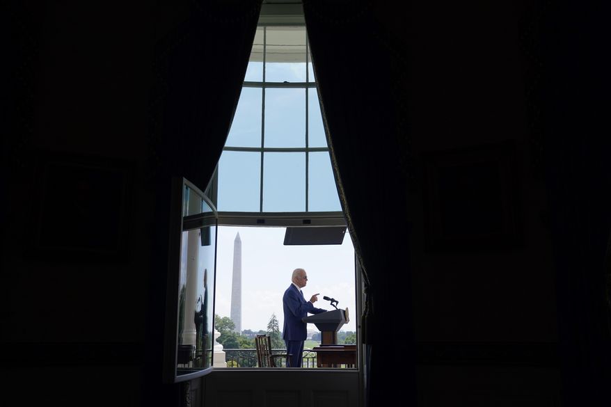 President Joe Biden speaks before signing two bills aimed at combating fraud in the COVID-19 small business relief programs Friday, Aug. 5, 2022, at the White House in Washington. Over five decades in Washington, President Joe Biden knew that the way to influence was to be in the room where it happens. But in the second year of his presidency, some of Biden’s most striking, legacy-defining legislative victories came about by staying out of it. (AP Photo/Evan Vucci, Pool, File)