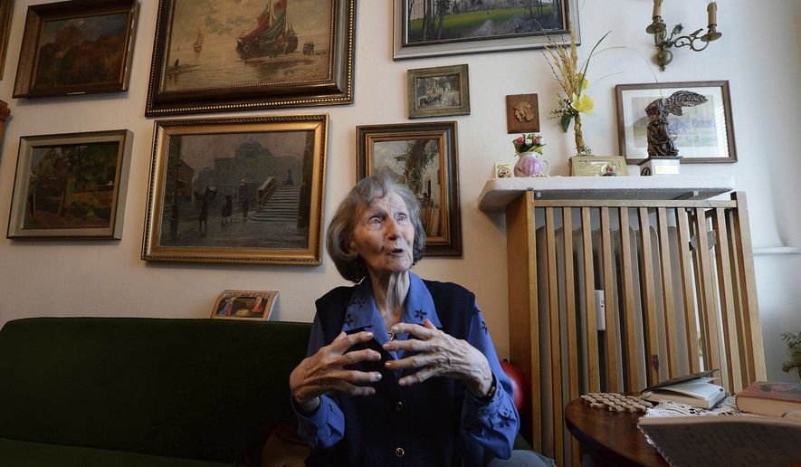 Zofia Posmysz, a 96-year-old Polish Catholic woman who survived the Nazi German concentration camps of Auschwitz and Ravensbrueck, speaks at her home in Warsaw, Poland, Tuesday, Jan. 14, 2020. Posmysz, who later became a journalist and author of novels including “The Passenger,” died Monday, Aug. 8, 2022, according to the Auschwitz-Birkenau state memorial museum. She was 98. (AP Photo/Czarek Sokolowski, File)