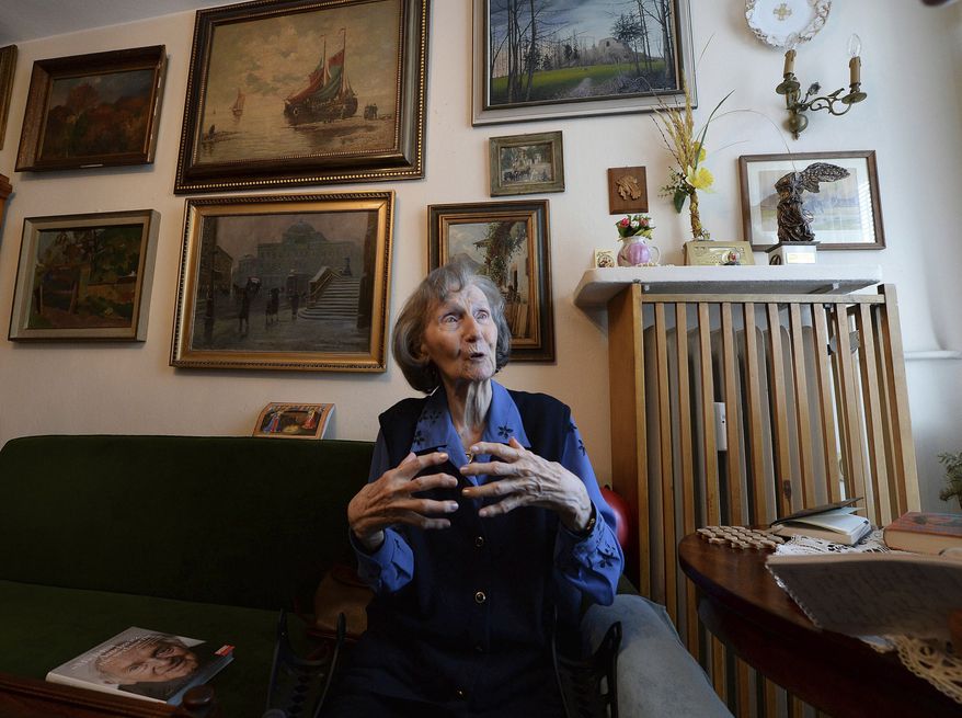 Zofia Posmysz, a 96-year-old Polish Catholic woman who survived the Nazi German concentration camps of Auschwitz and Ravensbrueck, speaks at her home in Warsaw, Poland, Tuesday, Jan. 14, 2020. Posmysz, who later became a journalist and author of novels including “The Passenger,” died Monday, Aug. 8, 2022, according to the Auschwitz-Birkenau state memorial museum. She was 98. (AP Photo/Czarek Sokolowski, File)