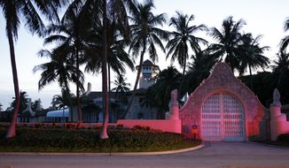 The entrance to former President Donald Trump&#39;s Mar-a-Lago estate is shown, Monday, Aug. 8, 2022, in Palm Beach, Fla. Trump said in a lengthy statement that the FBI was conducting a search of his Mar-a-Lago estate and asserted that agents had broken open a safe. (AP Photo/Terry Renna)