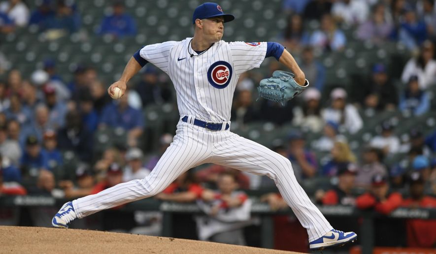 Chicago Cubs starter Keegan Thompson delivers a pitch during the first inning of a baseball game against the Washington Nationals Monday, Aug. 8, 2022, in Chicago. (AP Photo/Paul Beaty)