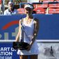 Liudmila Samsonova, of Russia, poses with the trophy after she won the final at the Citi Open tennis tournament against Kaia Kanepi, of Estonia, Sunday, Aug. 7, 2022, in Washington. (AP Photo/Nick Wass)