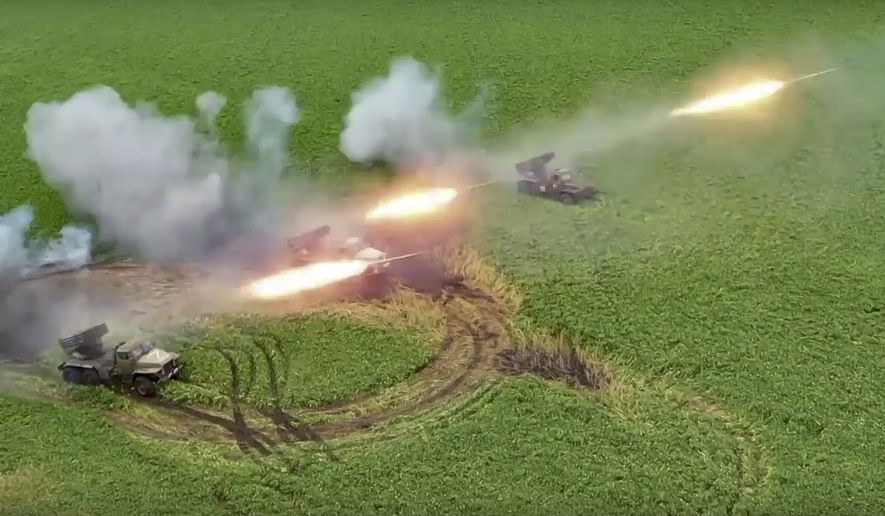 This handout photo taken from video released by Russian Defense Ministry Press Service on Monday, Aug. 8, 2022, shows the Russian military&#39;s Grad multiple rocket launchers firing rockets at Ukrainian troops at an undisclosed location. (Russian Defense Ministry Press Service photo via AP)