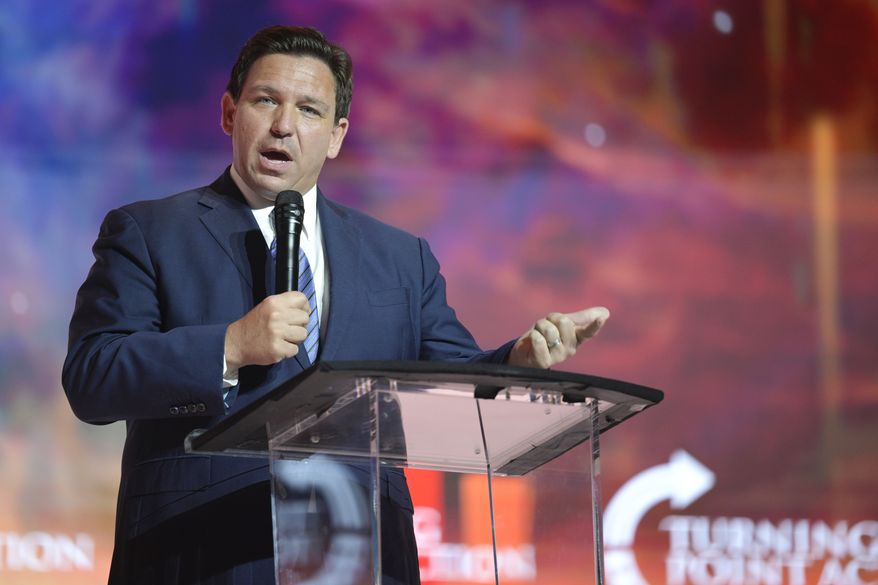 Florida Gov. Ron DeSantis addresses attendees during the Turning Point USA Student Action Summit, July 22, 2022, in Tampa, Fla. Florida Gov. Ron DeSantis, who likely represents former President Donald Trump&#x27;s strongest potential primary challenger, described the Biden administration as a “regime” and called the Mar-a-Lago search “another escalation in the weaponization of federal agencies against the Regime’s political opponents.” (AP Photo/Phelan M. Ebenhack, File)