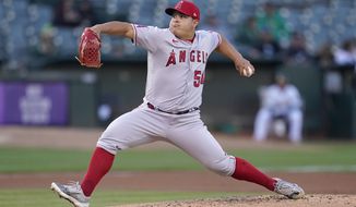 Los Angeles Angels&#x27; Jose Suarez pitches against the Oakland Athletics during the first inning of a baseball game in Oakland, Calif., Monday, Aug. 8, 2022. (AP Photo/Jeff Chiu)