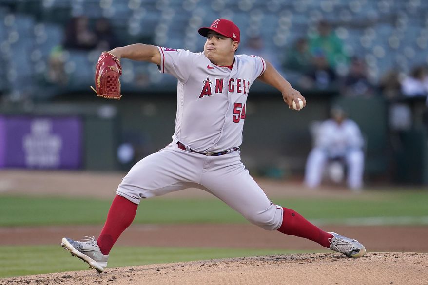 Los Angeles Angels&#x27; Jose Suarez pitches against the Oakland Athletics during the first inning of a baseball game in Oakland, Calif., Monday, Aug. 8, 2022. (AP Photo/Jeff Chiu)