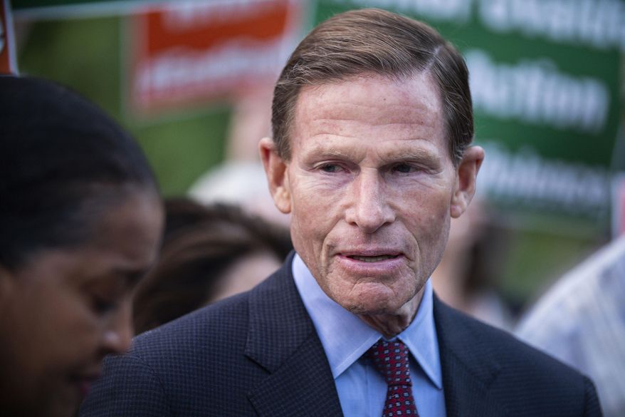 Sen. Richard Blumenthal, D-Conn., speaks to residents at the end of a vigil to stand in solidarity with the Uvalde, Texas, May 26, 2022, in Newtown, Conn. (AP Photo/Eduardo Munoz Alvarez, File)