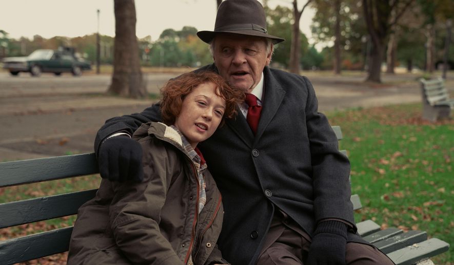 This image released by Focus Features shows Banks Repeta, left, and Anthony Hopkins in a scene from "Armageddon Time." The New York Film Festival will celebrate its 60th anniversary with a robust 32-film main slate and a number of hometown tales, including James Gray’s Queens coming-of-age drama “Armageddon Time." (Anne Joyce/Focus Features via AP)