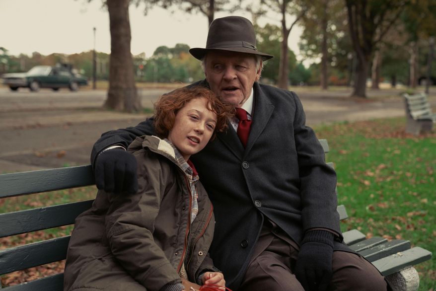 This image released by Focus Features shows Banks Repeta, left, and Anthony Hopkins in a scene from "Armageddon Time." The New York Film Festival will celebrate its 60th anniversary with a robust 32-film main slate and a number of hometown tales, including James Gray’s Queens coming-of-age drama “Armageddon Time." (Anne Joyce/Focus Features via AP)