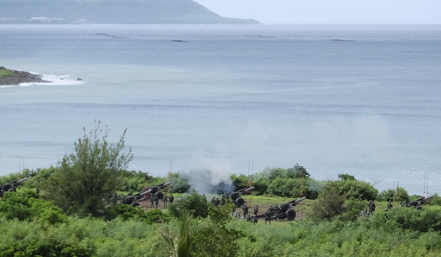 Taiwan military conducts artillery drills in Fangshan township, Pingtung, southern Taiwan, Tuesday, Nov. 9, 2022. Taiwan&#39;s official Central News Agency reported that Taiwan&#39;s army will conduct live-fire artillery drills in southern Pingtung county on Tuesday and Thursday, in response to the Chinese exercises. (AP Photo/Johnson Lai)