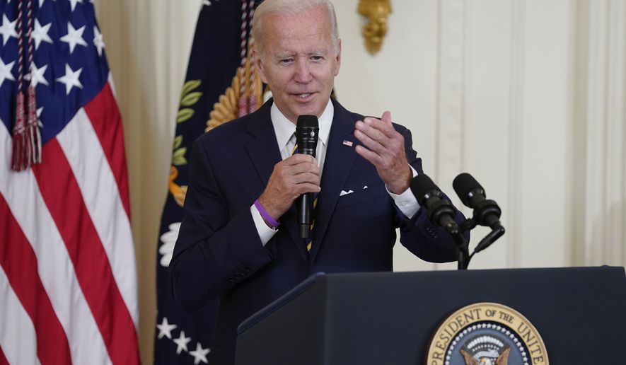 President Joe Biden speaks before signing the &quot;PACT Act of 2022&quot; during a ceremony in the East Room of the White House, Wednesday, Aug. 10, 2022, in Washington. (AP Photo/Evan Vucci)