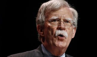In this July 8, 2019, file photo, then-National Security Adviser John Bolton speaks at the Christians United for Israel&#39;s annual summit, in Washington. The Justice Department says an Iranian operative has been charged in a plot to murder Bolton. (AP Photo/Patrick Semansky, File)