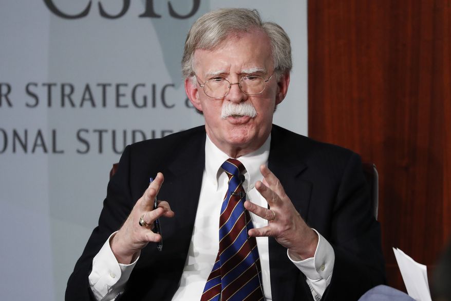 In this file photo, former National Security Adviser John R. Bolton gestures while speaking at the Center for Strategic and International Studies (CSIS) in Washington, Sept. 30, 2019. (AP Photo/Pablo Martinez Monsivais, File)