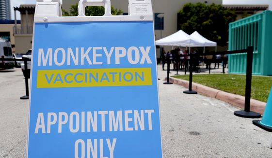 A sign for monkeypox vaccinations is shown at a vaccination site, Wednesday, Aug. 10, 2022, in Miami Beach, Fla. Miami-Dade County, in partnership with Nomi Health, will begin offering monkeypox vaccinations to eligible, high-risk residents on Friday. U.S. health officials on Tuesday authorized a plan to stretch the nation&#39;s limited supply of monkeypox vaccine by giving people just one-fifth the usual dose, citing research suggesting that the reduced amount is about as effective. (AP Photo/Lynne Sladky)