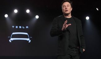 Tesla CEO Elon Musk speaks before unveiling the Model Y at the company&#39;s design studio on March 14, 2019, in Hawthorne, Calif. Musk is selling about 8 million Tesla shares worth nearly $7 billion as the billionaire looks to get his finances in order ahead of his court battle with Twitter. (AP Photo/Jae C. Hong, File)