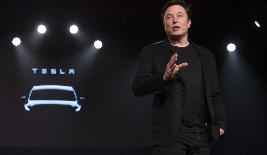 Tesla CEO Elon Musk speaks before unveiling the Model Y at the company's design studio on March 14, 2019, in Hawthorne, Calif. Musk is selling about 8 million Tesla shares worth nearly $7 billion as the billionaire looks to get his finances in order ahead of his court battle with Twitter. (AP Photo/Jae C. Hong, File)