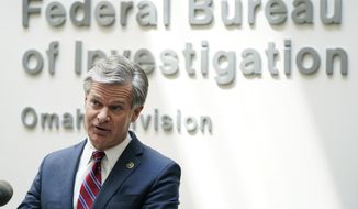 FBI Director Christopher Wray speaks during a news conference, Wednesday, Aug. 10, 2022, in Omaha, Neb. (AP Photo/Charlie Neibergall) ** FILE **
