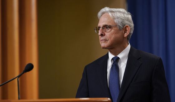 Attorney General Merrick Garland listens to a question as he leaves the podium after speaking at the Justice Department Thursday, Aug. 11, 2022, in Washington. (AP Photo/Susan Walsh) ** FILE **