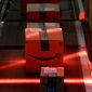 Packages riding on a belt are scanned to be loaded onto delivery trucks at the Amazon Fulfillment center in Robbinsville Township, N.J., on Aug. 1, 2017. Federal work-safety investigators are looking into the death of an Amazon worker and an injury that potentially led to the death of another employee, adding to a probe already underway following a third fatality during the company&#39;s annual Prime Day shopping event in mid-July, 2022. (AP Photo/Julio Cortez, File)