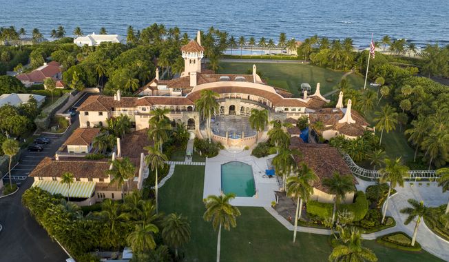 An aerial view of President Donald Trump&#x27;s Mar-a-Lago estate is seen Wednesday, Aug. 10, 2022, in Palm Beach, Fla. The FBI searched Trump&#x27;s Mar-a-Lago estate as part of an investigation into whether he took classified records from the White House to his Florida residence, people familiar with the matter said Monday. (AP Photo/Steve Helber)