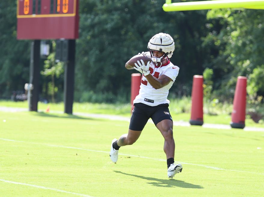 Washington Commanders Running Back Antonio Gibson (24) makes a catch during training camp at The Park in Ashburn VA on August 11th 2022. (Photo: Alyssa Howell)