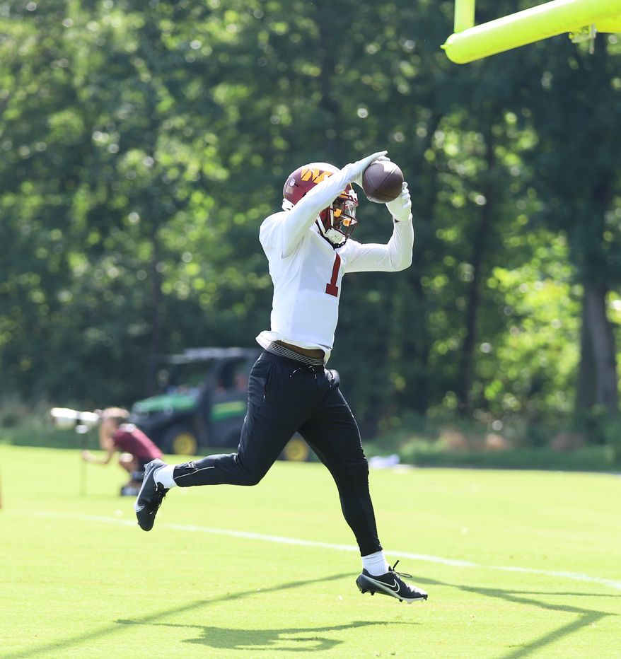 Washington Commanders Wide Reciever Jahan Dotson (1) leaps to complete the pass at during training camp at The Park in Ashburn VA on August 11th 2022. (Photo: Alyssa Howell)