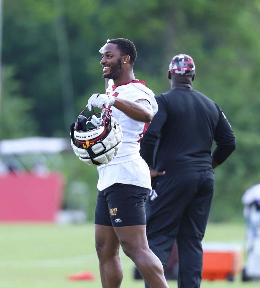 Washington Commanders Running Back Antonio Gibson (24) standing to the side on the field during training camp at The Park in Ashburn VA on August 11th 2022. (Photo: Alyssa Howell)