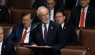 Rep. Dan Newhouse, R-Wash., speaks as the House of Representatives debates the articles of impeachment against President Donald Trump at the Capitol in Washington on Dec. 18, 2019. Newhouse was one of 10 Republicans who voted to impeach Trump last year, and is one of only two to beat back GOP challengers this year. (House Television via AP, File)