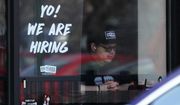 A hiring sign is displayed at a restaurant in Schaumburg, Ill., Friday, April 1, 2022. (AP Photo/Nam Y. Huh, File)