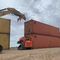 This photo provided by the Arizona Governor&#39;s Office shows shipping containers that will be used to fill a 1,000 foot gap in the border wall with Mexico near Yuma, Ariz., on Friday, Aug. 12, 2022. Two will be stacked atop each other and then topped with razor wire to slow migrants from crossing into Arizona. Republican Gov. Doug Ducey acted without federal permission and plans to fill three gaps totaling 3,000 feet in the coming weeks. (Arizona Governor&#39;s Office via AP)