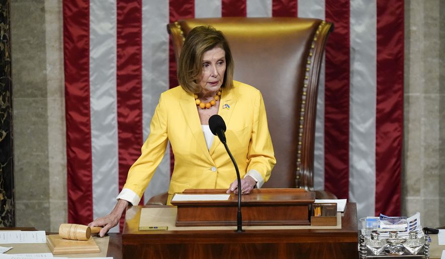 House Speaker Nancy Pelosi of Calif., prepares to lead a vote on the Inflation Reduction Act in the House chamber at the Capitol in Washington, Friday, Aug. 12, 2022. (AP Photo/Patrick Semansky)