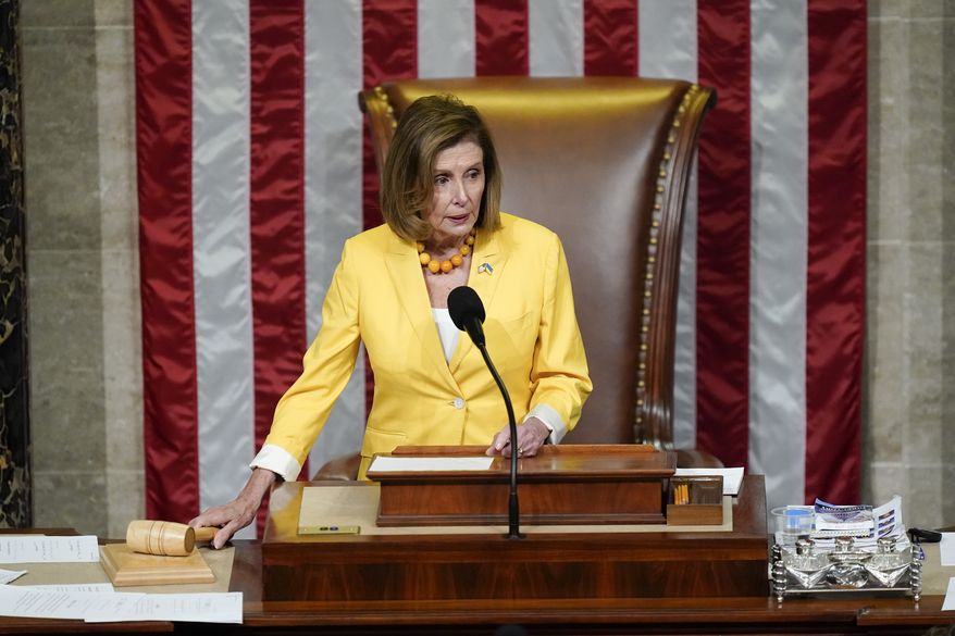 House Speaker Nancy Pelosi of Calif., prepares to lead a vote on the Inflation Reduction Act in the House chamber at the Capitol in Washington, Friday, Aug. 12, 2022. (AP Photo/Patrick Semansky)