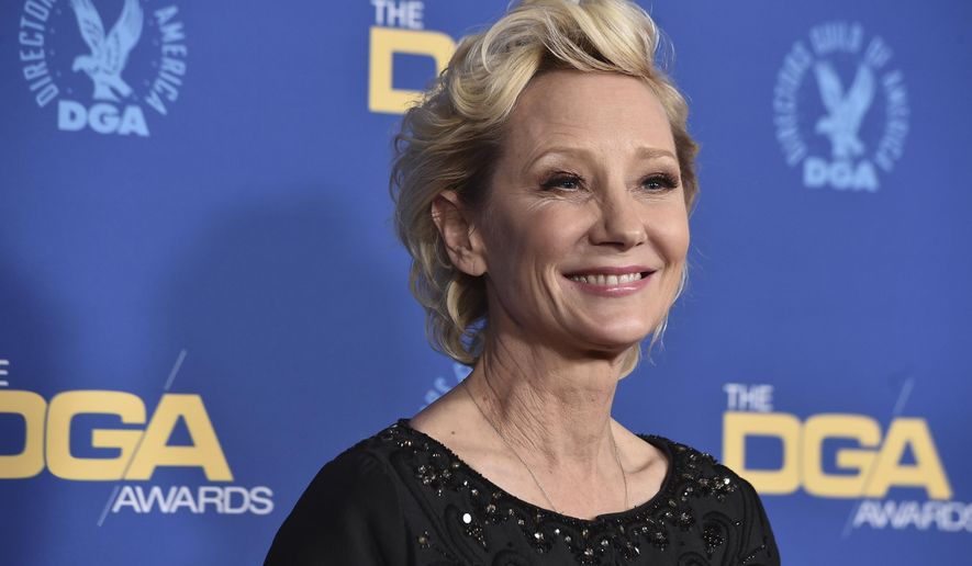 Anne Heche arrives at the 74th annual Directors Guild of America Awards on March 12, 2022, in Beverly Hills, Calif.  A spokesperson for  Heche says the actor is on life support after suffering a brain injury in a fiery crash a week ago and isn&#39;t expected to survive. The statement released on behalf of her family said she is being kept on life support to determine if she is a viable organ donor.  (Photo by Jordan Strauss/Invision/AP, File)