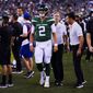 New York Jets&#39; Zach Wilson walks on the sidelines after he is taken off the field following an injury during the first half of a preseason NFL football game against the Philadelphia Eagles on Friday, Aug. 12, 2022, in Philadelphia. (AP Photo/Matt Rourke)