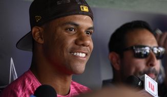 San Diego Padres&#39; Juan Soto talks to the media before a baseball game against the Washington Nationals, Friday, Aug. 12, 2022, in Washington. (AP Photo/Nick Wass)