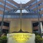 A cross and Bible sculpture stand outside the Southern Baptist Convention headquarters in Nashville, Tenn., on May 24, 2022. The Executive Committee of the Southern Baptist Convention said Friday, Aug. 12, 2022, that several of the denomination&#39;s major entities are under investigation by the U.S. Department of Justice. (AP Photo/Holly Meyer, File)