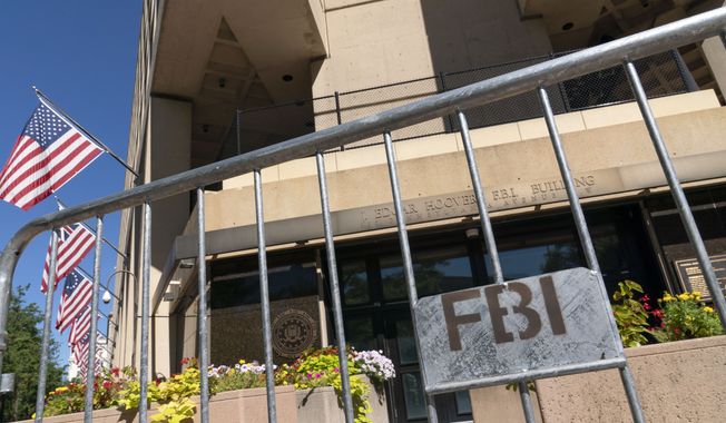 The Federal Bureau of Investigation (FBI) building headquarters is seen in Washington on Saturday, Aug. 13, 2022. (AP Photo/Jose Luis Magana) **FILE**