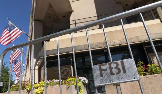 The Federal Bureau of Investigation (FBI) building headquarters is seen in Washington on Saturday, Aug. 13, 2022. (AP Photo/Jose Luis Magana) ** FILE **