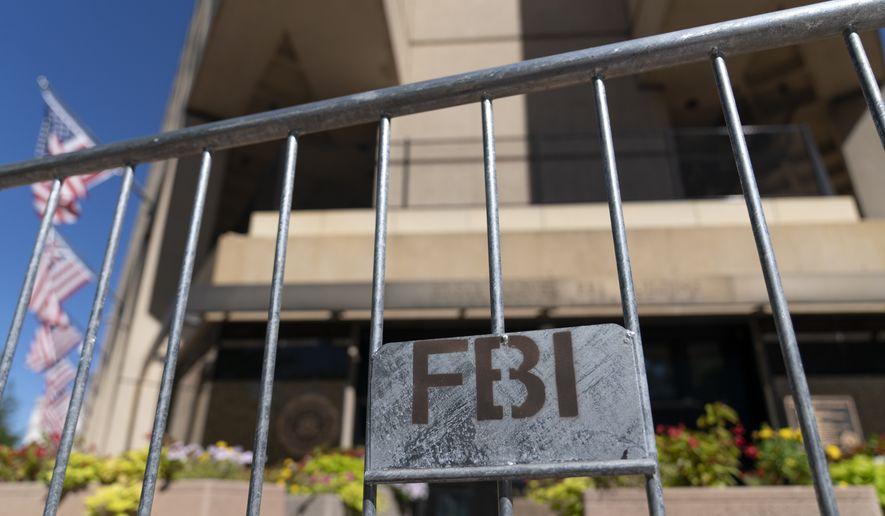 The Federal Bureau of Investigation (FBI) building headquarters is seen in Washington, Saturday, Aug. 13, 2022. (AP Photo/Jose Luis Magana)