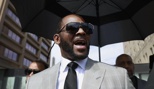 Musician R. Kelly leaves the Leighton Criminal Court Building in Chicago on June 6, 2019. Kelly’s federal trial starts Monday in Chicago. (AP Photo/Amr Alfiky, File)
