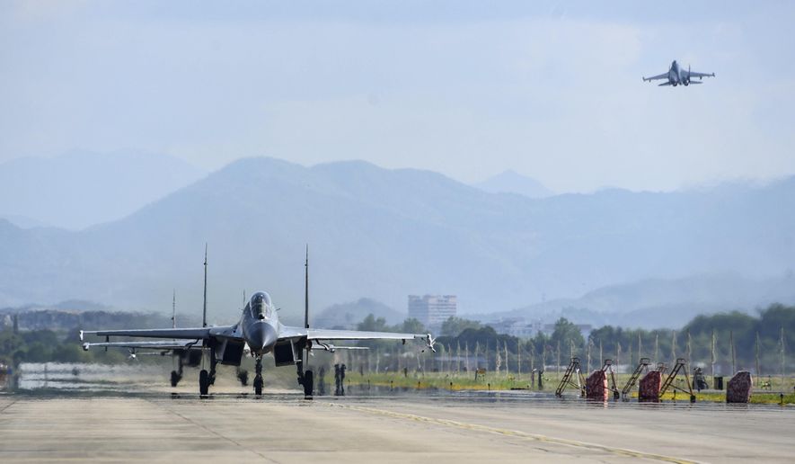 In this photo released by China&#39;s Xinhua News Agency, air force and naval aviation corps of the Eastern Theater Command of the Chinese People&#39;s Liberation Army (PLA) fly planes at an unspecified location in China, Aug. 4, 2022. The Chinese air force is sending fighter jets and bombers to Thailand for a joint exercise with the Thai military on Sunday, Aug. 14, 2022. (Fu Gan/Xinhua via AP, File)