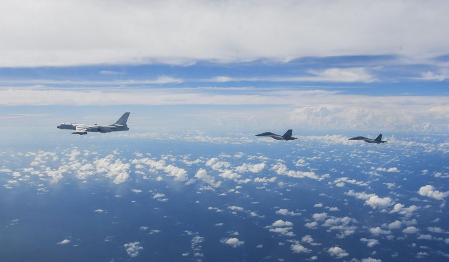 In this photo released by Xinhua News Agency, aircraft of the Eastern Theater Command of the Chinese People&#39;s Liberation Army (PLA) conduct a joint combat training exercises around the Taiwan Island, Aug. 7, 2022. While inflation and recession fears weigh heavily on the minds of voters, another issue is popping up in political campaigns from the U.K. and Australia to the U.S. and beyond: the “China threat.&amp;quot; The two finalists vying to become Britain&#39;s next prime minister, Liz Truss and Rishi Sunak, clashed in a televised debate last month over who would be toughest on China. (Li Bingyu/Xinhua via AP, File)