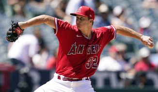 Los Angeles Angels starting pitcher Tucker Davidson throws to a Minnesota Twins batter during the fourth inning of a baseball game Sunday, Aug. 14, 2022, in Anaheim, Calif. (AP Photo/Marcio Jose Sanchez)