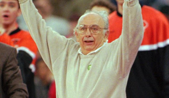 Princeton coach Pete Carril reacts as the Tigers defeat UCLA 43-41 in the first round of the NCAA Southeast regional Thursday, March 14, 1996, in Indianapolis. (AP Photo/Tom Strattman)