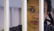 U.S. basketball player Brittney Griner looks through bars as she listens to the verdict standing in a cage in a courtroom in Khimki, outside Moscow, Russia, Thursday, Aug. 4, 2022. Griner&#39;s lawyers on Monday, Aug. 15, 2022, filed an appeal of her nine-year Russian prison sentence for drugs possession. Griner, a center for the Phoenix Mercury and a two-time Olympic gold medalist, was convicted on Aug. 4. She was arrested in February at Moscow&#39;s Sheremetyevo Airport after vape canisters containing cannabis oil were found in her luggage. (Evgenia Novozhenina/Pool Photo via AP, File)