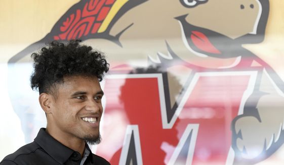 University of Maryland quarterback Taulia Tagovailoa speaks during the team&#39;s college football media day, Wednesday, Aug. 3, 2022, in College Park, Md. (AP Photo/Steve Ruark) **FILE**