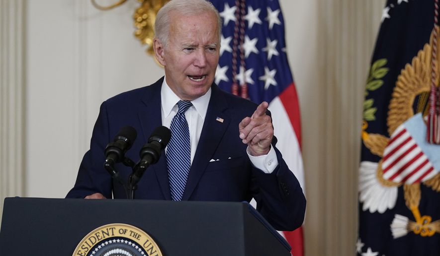 President Joe Biden speaks before signing the Democrats&#39; landmark climate change and health care bill in the State Dining Room of the White House in Washington, Tuesday, Aug. 16, 2022. (AP Photo/Susan Walsh)