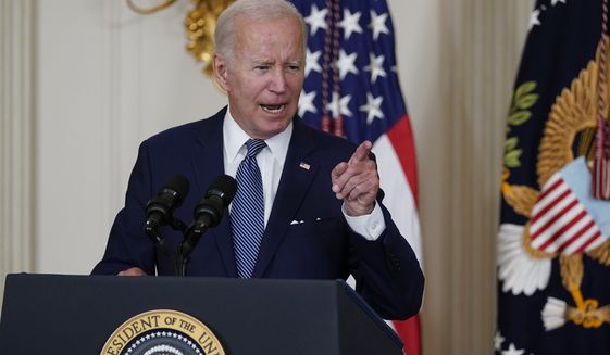 President Joe Biden speaks before signing the Democrats&#39; landmark climate change and health care bill in the State Dining Room of the White House in Washington, Tuesday, Aug. 16, 2022. (AP Photo/Susan Walsh)