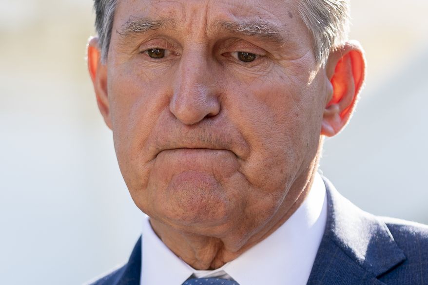 In this file photo, Sen. Joe Manchin, D-W.Va., speaks to reporters outside the West Wing of the White House in Washington, Tuesday, Aug. 16, 2022, after President Joe Biden signed the Democrats&#x27; landmark climate change and health care bill. (AP Photo/Andrew Harnik)  **FILE**